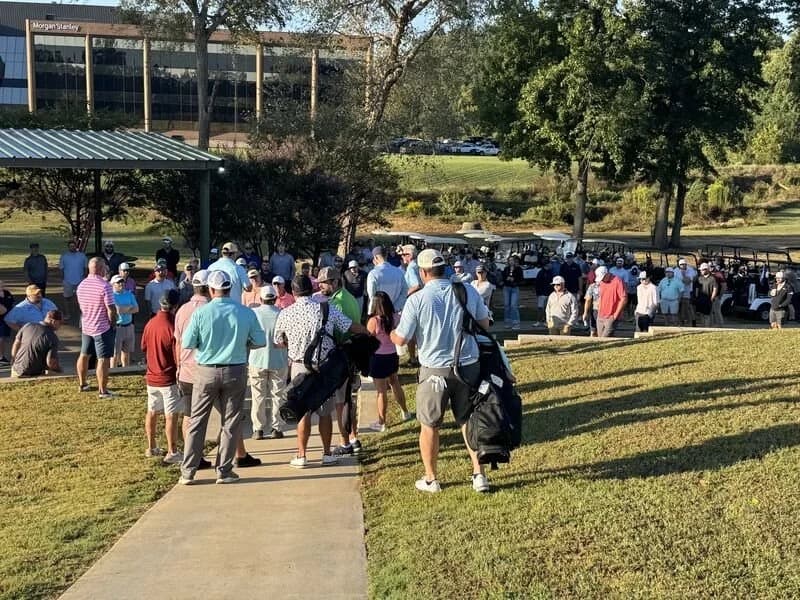 Golfers at the Piney Woods Golf Tournament